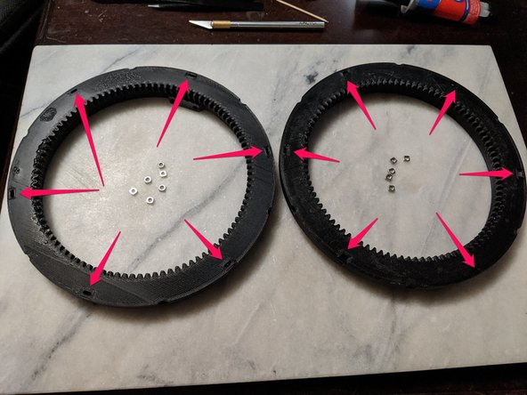 The nuts are inserted into the slots pointed out as shown in Pic 2.