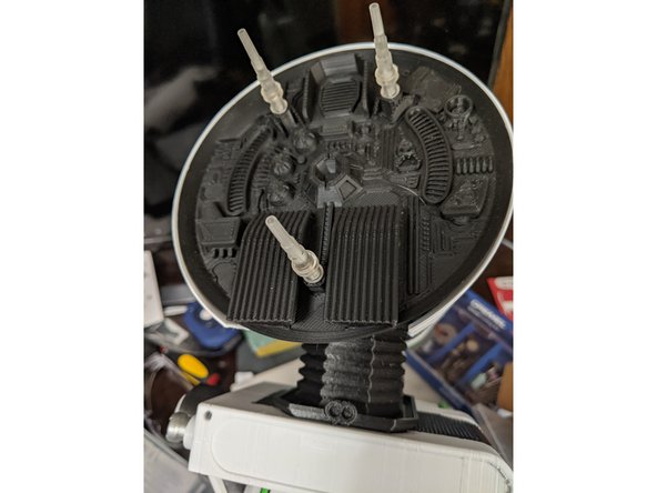 Insert the third AerialBase into the lower hole of the RearPanel and screw it into the Square Nut you are holding in place. Tighten the AerialBase.