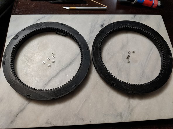 This step will use the InnerSusanA and InnerSusanB prints along with 12 M3 square nuts as shown in Pic 1.