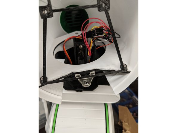 Here we will install the RearPanel print onto the head and finish out the assembly.