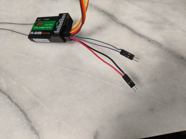 The signal wires will both go into one of the two pin housings, and the positive and ground will go into the other two pin housing as shown in Pic 3.