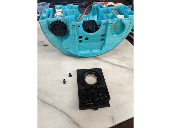 Here you will use the FrontInsert print and 2 M4 x 10mm long countersunk screws. 8mm long screws will work as well if you do not have 10mm, but I used 10mm just fine as that is what I had.