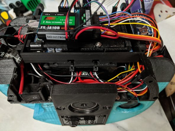 There are 4 holes that will line up on the two mounts.  I used these 4 spots for zip ties as shown in Pic 1.