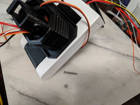 Here you will use a 25mm long M3 countersunk screw and two M3 nuts.  I ended up changing these to lock nuts since I had them and suggest if you have them, you do the same