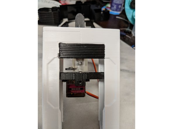 Place the ServoCouple on the servo horn and seat it down as shown in Pic 1.