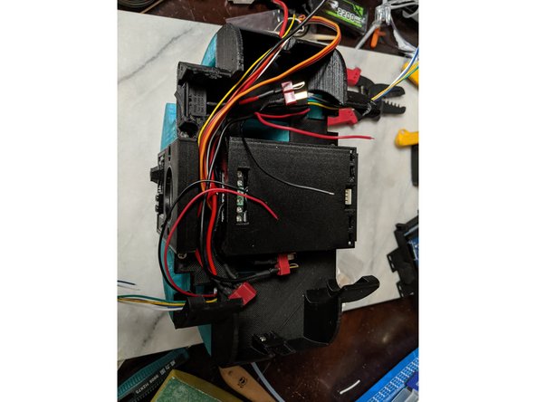 Here you will use the red and black wires from each drive motor and connect them to the Motor Driver.