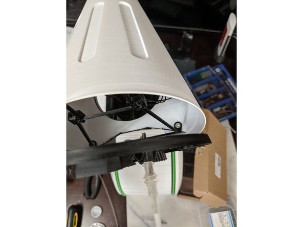 First clip the LowerAerialBracket print onto the bottom bar of the RearFrame as shown in Pic 1. There is a square cutout on the back of it for a M3 square nut that is easiest left till later to install.