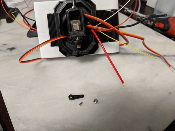 This step is simple, but since I'm limited to 3 pics per step, here it is.  You will mount the servo horn on the Servo you just installed.