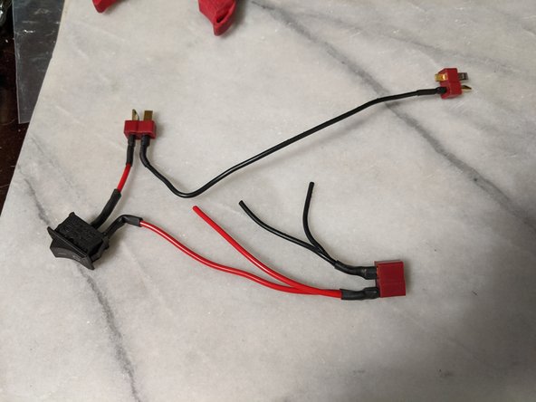 Attach the other two black wires to the remaining leg of the female connector as shown in Pic 1.