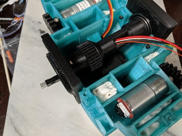 The wires should exit as shown in Pic 2. and make sure the plug stays sticking out of the side where it will be plugged into the head wires as seen in Pic 2.