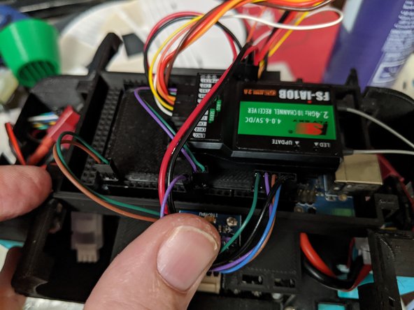 The two signal wires will go to Pins 3 and 4 of the Arduino.  This will be next to the plug we put into pin 2 in an earlier step.  See Pic 3 as reference.
