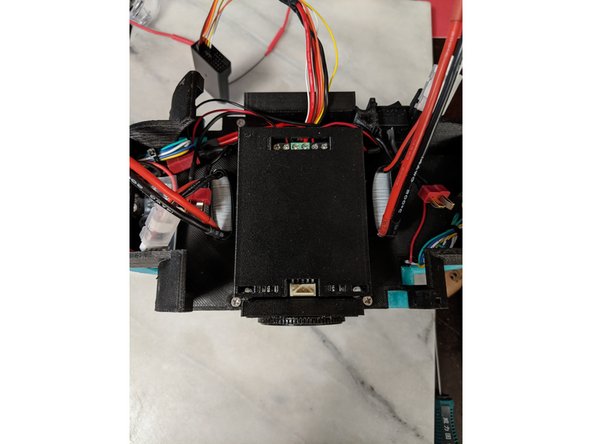 They slide into the holes in the frame as shown in Pic 2.