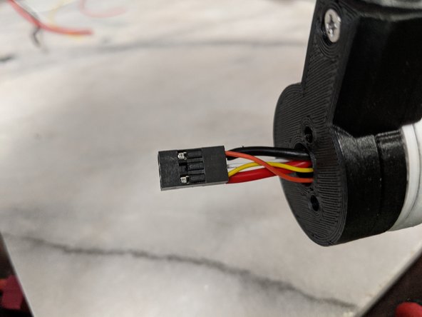 Pin 1 location is marked on the plug with a small arrow.   The order of wires is up to you.  For me, I used Pin 1 for the ground wire and the opposite on that row for the positive power to keep the power wires separate from each other.  Then just put the servo wires in any order.