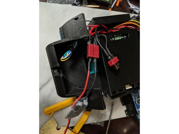 The UBEC plugs into the female plug on the power wire harness we made as shown in Pic 1.