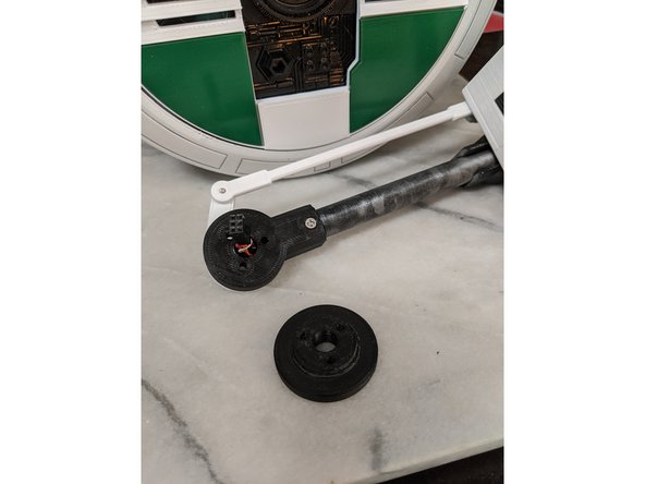 Now we will prep the head assembly for attaching to the body.  You will need the head assembly from the previous step, the MainBarHolderB print and 3x M3 x 35mm long countersunk screws.