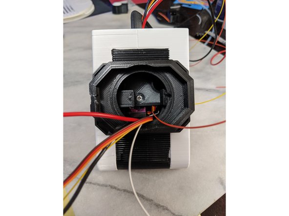 The large hole the wires come through on the MainNeck will line up with the hole in the top of the HeadBox for proper orientation.