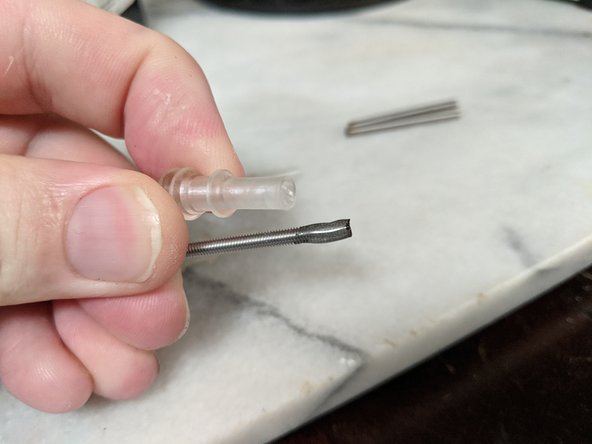 The first thing I tried was epoxy, and if you printed these with a FDM printer, it would work great.  Mine did not hold well, so I changed and used CA (super) glue.  This held very well so you can use the adhesive of your choice.