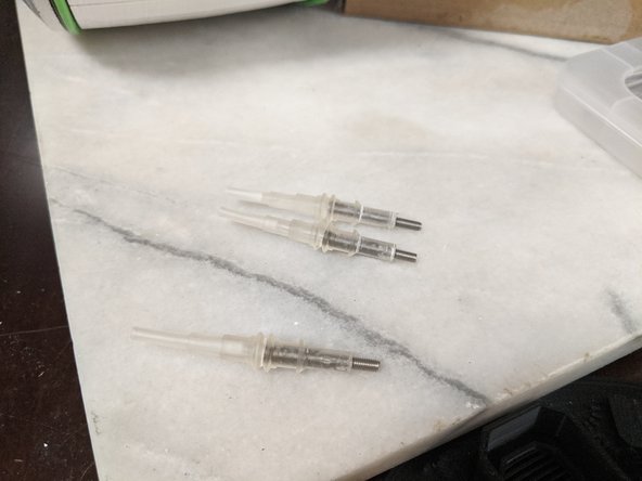 Put the adhesive on the end where you cut.  This way you do not try to thread the cut side onto the nut later.  Also put a small drop in the print and insert the threaded rod into the print.  Spin the threaded rod around to get a good coating of epoxy or glue inside and let sit to fully cure.