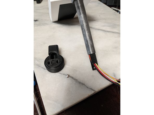 This will use the MainBarHolderA print and a M3 x 10mm long countersunk screw.