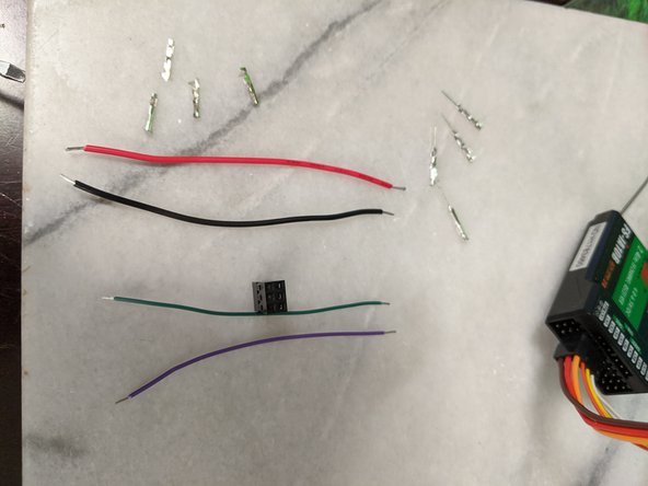 Now we will make a wire harness for the RC receiver to Arduino.  You will use 4 wires. 2 wires are signal style wires, and a positive and ground wire.