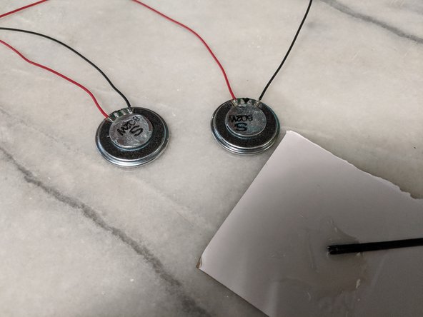 Here you can use your preferred method of attaching the speakers to the frame.  I decided to use 2 part epoxy.  If you wish you can use double sided tape.