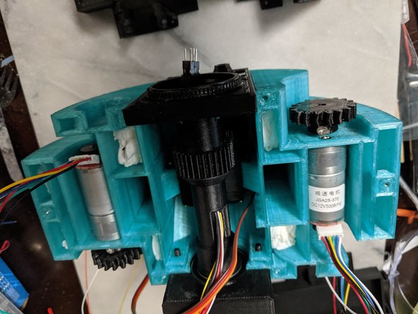 A few things to do before attaching the top frame on.  First plug in the drive motor wires if your motors have pluggable wires.  My motors are shorter than the ones Michael used, so I also had to bend back the plugs slightly as seen in Pic 1.