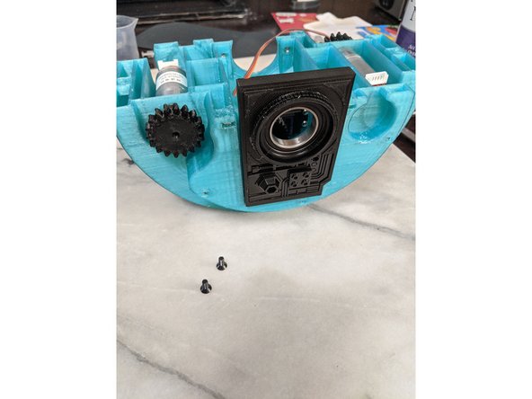 Insert the FrontInsert into the frame and click it down engaging the tab on the bottom of the FrameInsert into the MainFrame and clicking it down fully as shown in Pic 2.