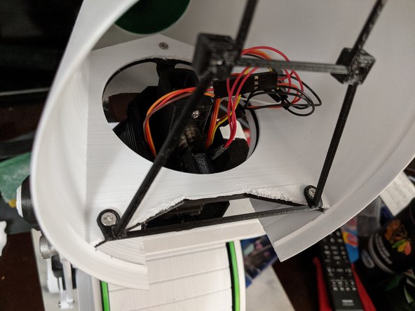 Use the 2 screws at the base to secure the RearFrame onto the brackets as shown in Pic 3.