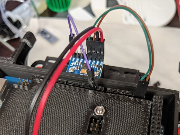 The single pin that is connected to the pin labeled INT on the MPU board will go to Arduino Pin 2.  Use Pic 2 as reference.