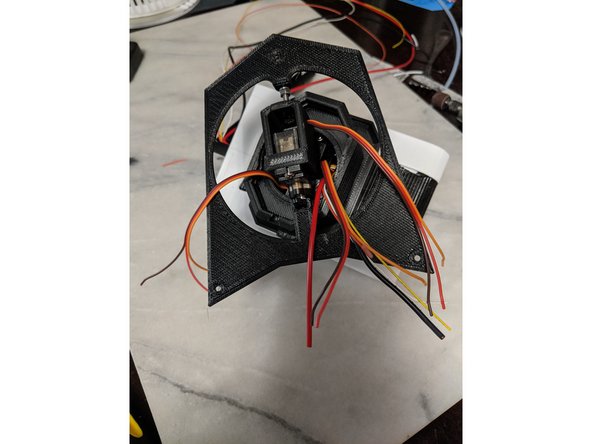 Here we will do all the wiring connections in the head for the 3 servos.