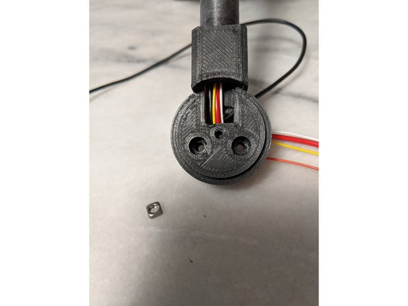 The screw hole in the center of the MainBarHolderA is covered for easier printing.  Drill out the center hole so a M3 screw fits in there smoothly as seen in Pic 1.