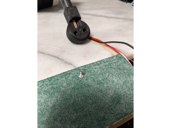 I used some sandpaper to rough up the head of the screw so epoxy will stick to it better as shown in Pic 1.