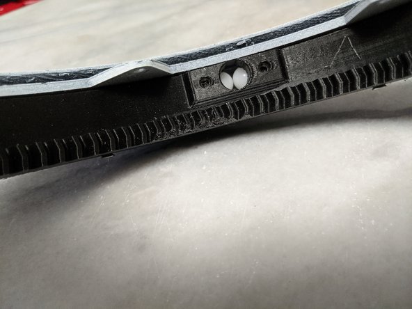 The final bearing will be sticking out like Pic 2, and you can use a screwdriver or pretty much anything to get it all the way into the channel.