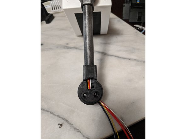 Feed the wires into the MainBarHolderA print and out the round hole on the back.   Slide the MainBarHolderA onto the HeadBar all the way up and meet the BarSkin as seen in Pic 2.  Look at the hole on the back and make sure the hole lines up witht he hole in the HeadBar.