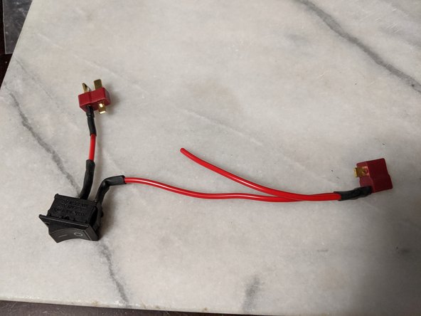 Attach the other end of the long wire and one side of the final wire both to the same pin of the female plug as seen in Pic 2.  Make sure it is to the positive pin of this plug as well.