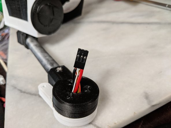 Pin 1 location is marked on the plug with a small arrow.   The order of wires is up to you.  For me, I used Pin 1 for the ground wire and the opposite on that row for the positive power to keep the power wires separate from each other.  Then just put the servo wires in any order.