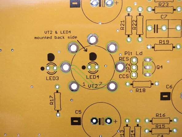 Photo 2 - Note the black &quot;-&quot; (minus) sign on the capacitor outlines  and the black dots on the LED pads as well as the outline of the LED showing the flat. Nice touch to help alignment.