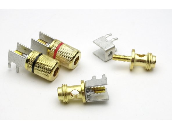 Some binding posts run out of threads when they're screwed all the way in. Adding the included split washer between the parts will help the threads stay engaged and hold alignment while soldering.