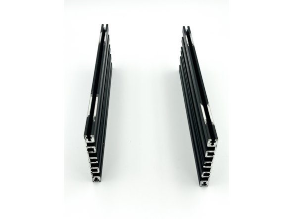 Using your favorite method (a rotary tool works nicely as does a few scrapes with a razor blade) expose some bare metal by removing the anodization from the side panels in a few places where they will meet the top, bottom, front and back panels.