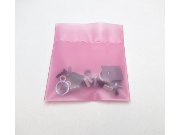 Bottom row L to R - Self tapping screws for RCA jacks (2), Black countersunk screws for standoffs on chassis outside (4), Screws and locknuts for transistors on heatsinks (2), silver screws for attaching PCB to standoffs inside the chassis (4).