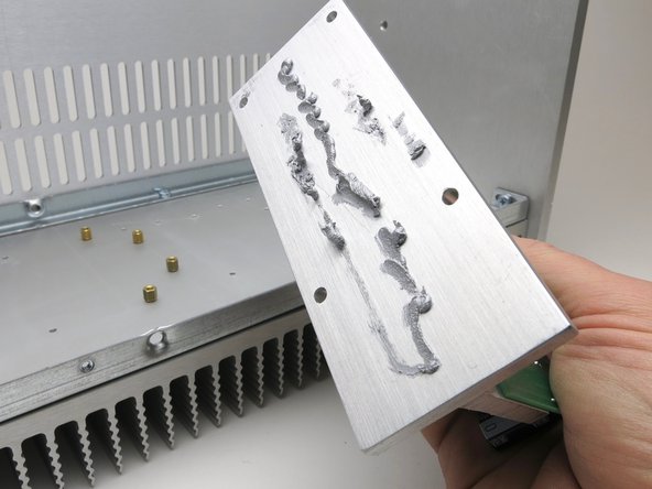 Smear it all over.  Try achieve a smooth even covering over the entire surface.  Some users like to use a straight razor blade or a plastic spreader to even out the material.