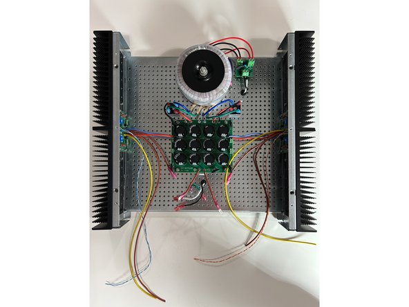 Collect your heatsink / amplifier board assemblies, lay them as they will be mounted to the perforated base plate and estimate the wire lengths from the amp boards to the PSU.  Remember, you'll be twisting the V+ and V-.  You can try to get it exact if you like, but it is safer to have excess wire.