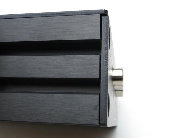 The PCB will be slightly behind the side rails, and the top plate will hang over both the PCB and rails.