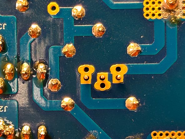 The pads for the pots support many different pin orientations.  These pins are in-line and go in the center holes.