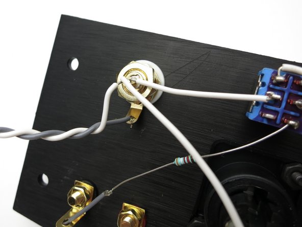 Connect 39K resistor from pin 6 of switch to White channel black speaker post.