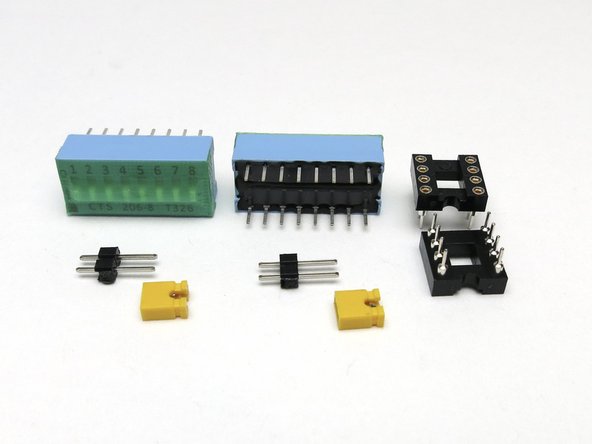 DIP switches, DIP sockets, and the header pins with jumpers.