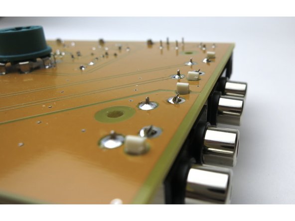 The RCA connectors. These have snap-in tabs as well as metal connections.