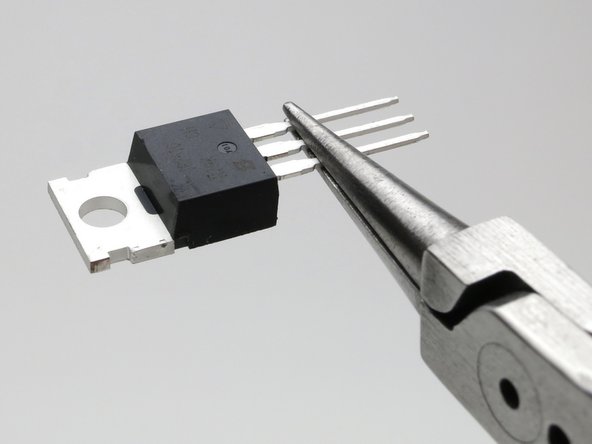 Bend legs down at point shown.