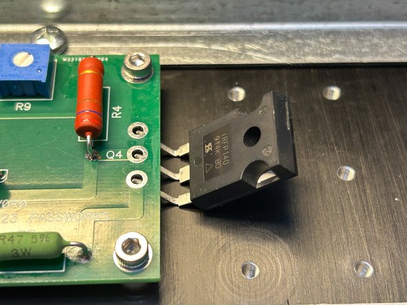 Angle the MOSFETs, and gently slide the MOSFET legs into the holes on the amp boards.  They should just fit if you've bent the legs to 90 degrees.  If not, you can slightly loosen the PCB mounting bolts and/or adjust the bend in the legs slightly.