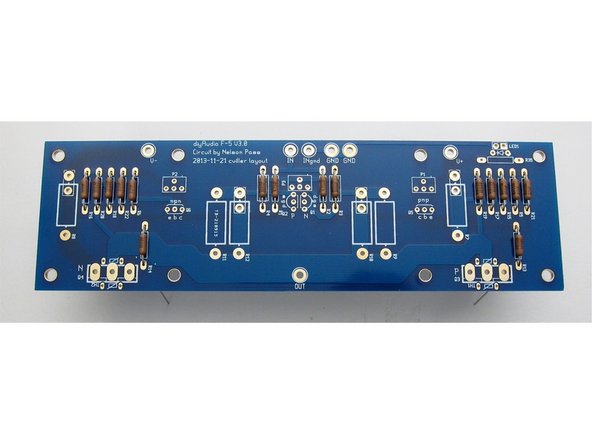 Photo 2) PCB with just small resistors.
